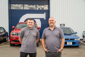 Directors of The Turbo Guy pictured outside Glasgow premises